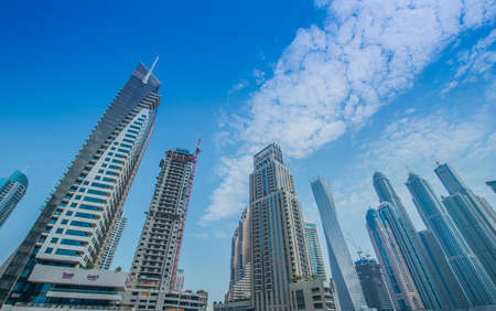 Dubai - AUGUST 9, 2014: Dubai Marina district on August 9 in UAE, Dubai. Dubai Marina district is a popular residential and business area.のeditorial素材