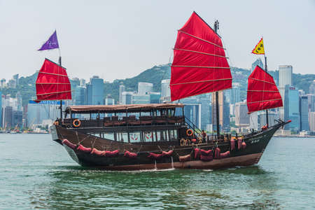 Hong Kong - JULY 27, 2014: Hong Kong Victoria Harbour on July 27 in China, Hong Kong. Aqua Luna is popular tourist attraction in Hong Kongのeditorial素材