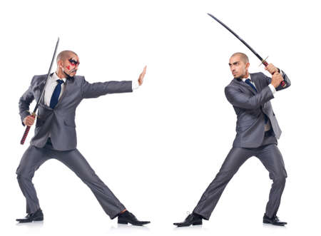 Two men figthing with the sword isolated on whiteの写真素材