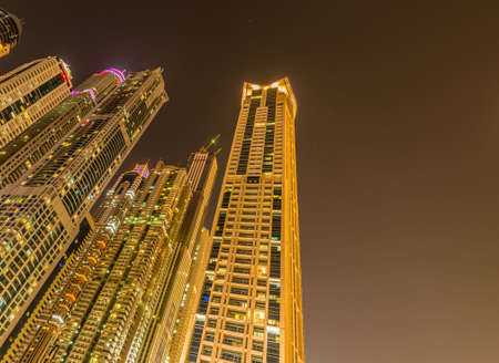 Dubai marina skyscrapers during night hours