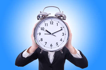 Funny woman with clock on white