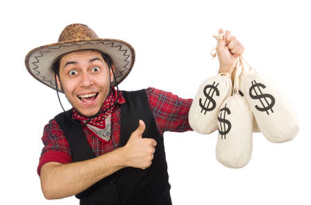 Young cowboy with money bags isolated on whiteの写真素材