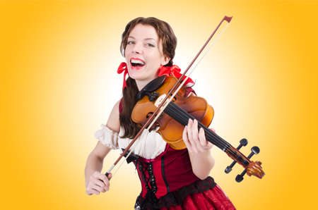 Woman with violin isolated on whiteの写真素材