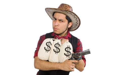 Young cowboy with gun and money bags isolated on whiteの写真素材