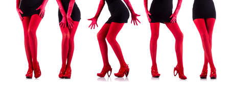 Woman legs isolated on the white の写真素材