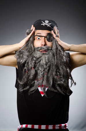 Man in pirate costume isolated on whiteの写真素材
