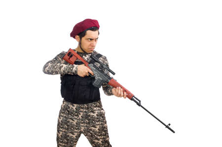 Soldier with a weapon isolated on whiteの写真素材