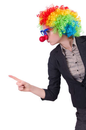 Businessman with clown wig isolated on whiteの写真素材