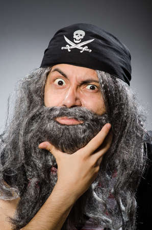 Man in pirate costume isolated on whiteの写真素材