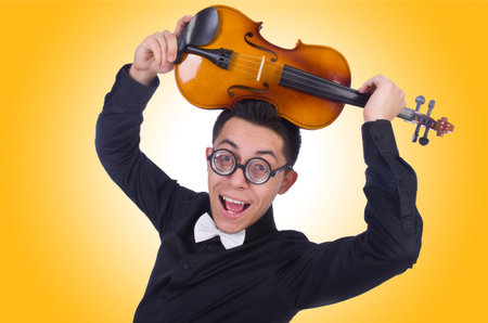Funny violin player on whiteの写真素材