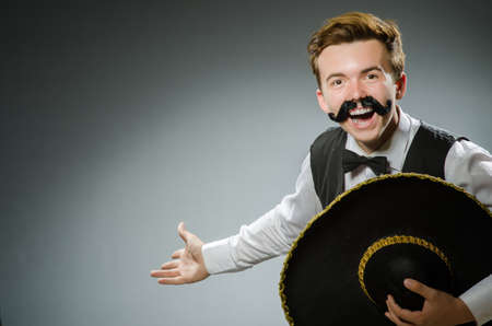 Smiling mexican with sombrero isolated on whiteの写真素材