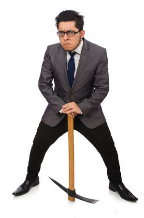 Young businessman holding a tool isolated on whiteの写真素材