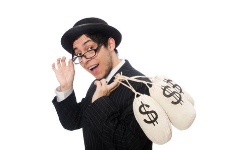 Young employee holding money bags isolated on whiteの写真素材