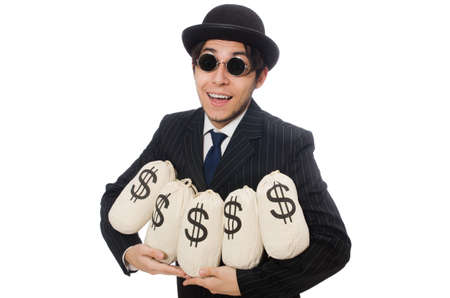 Young employee holding money bags isolated on whiteの写真素材