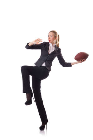 Preety office employee with rugby ball isolated on whiteの写真素材