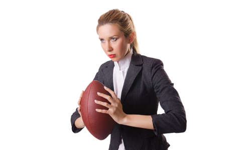 Preety office employee with rugby ball isolated on whiteの写真素材