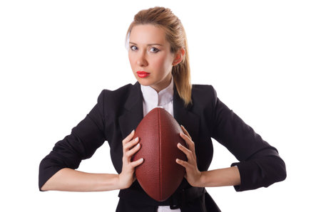 Preety office employee with rugby ball isolated on whiteの写真素材
