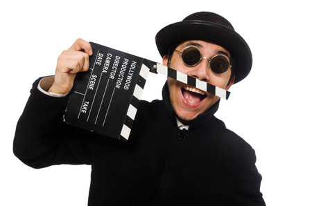 Young man with clapper-board isolated on whiteの写真素材