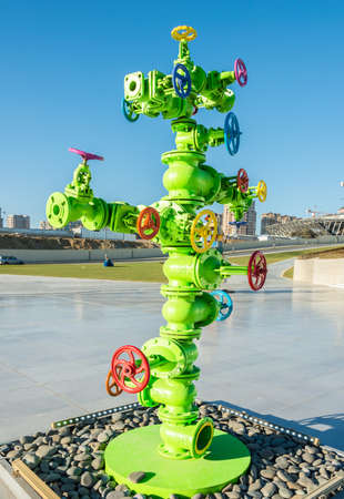 Modern art installation with oil industry pipingの写真素材