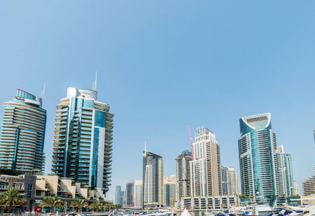 Dubai - AUGUST 9, 2014: Dubai Marina district on August 9 in UAE, Dubai. Dubai Marina district is a popular residential and business area.のeditorial素材