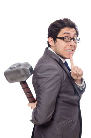 Business man holding hammer isolated on whiteの写真素材