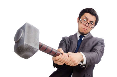 Business man holding hammer isolated on whiteの写真素材