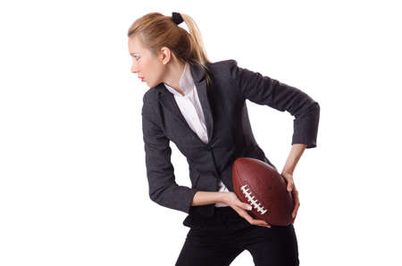 Preety office employee with rugby ball isolated on whiteの写真素材