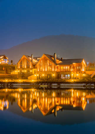 Nice modern house near lakeの写真素材