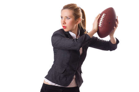 Preety office employee with rugby ball isolated on whiteの写真素材