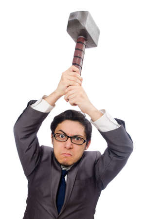 Business man holding hammer isolated on whiteの写真素材