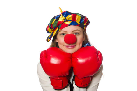 Pretty female clown with box gloves isolated on whiteの写真素材