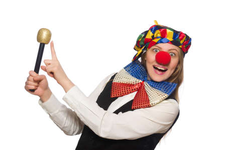Pretty female clown with maracas isolated on whiteの写真素材