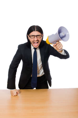 Young businessman with loudspeaker on whiteの写真素材