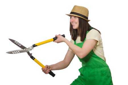 Young woman with shears on whiteの写真素材