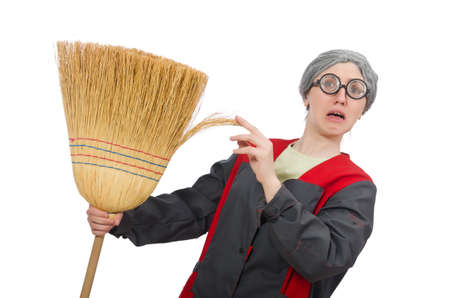 Woman with sweeping brush isolated on whiteの写真素材