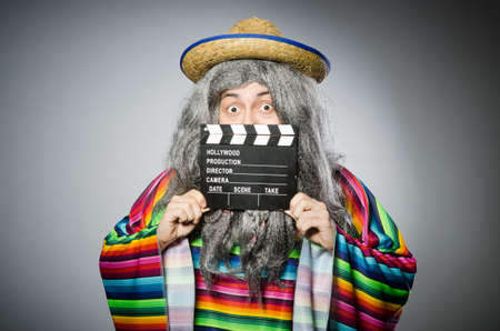 Funny hairy mexican with movie clapperの写真素材