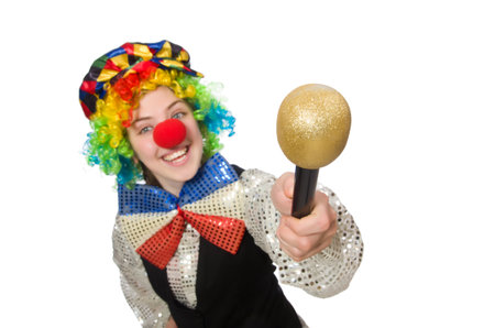 Female clown with maracas isolated on whiteの写真素材