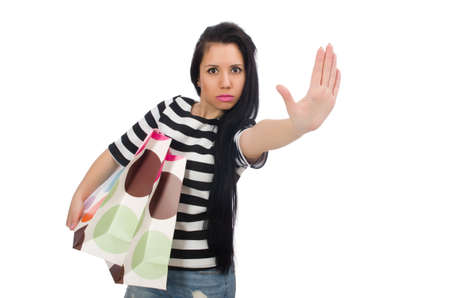 Woman with shopping bags isolated on whiteの写真素材