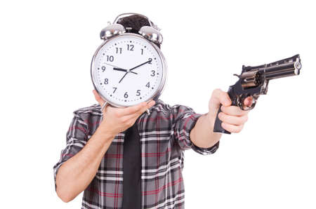 Employee holding alarm clock and weapon isolated on whiteの写真素材