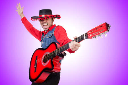 Guitar player isolated on the whiteの写真素材