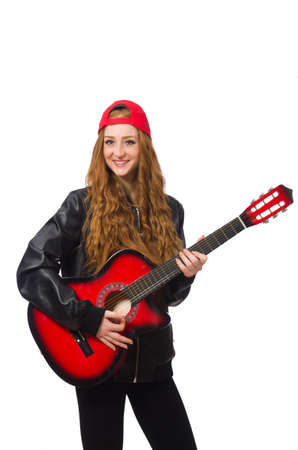 Pretty girl with guitar isolated on whiteの写真素材