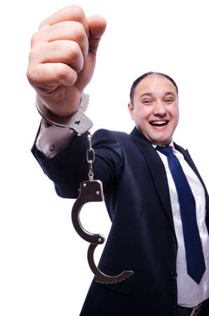 Businessman handcuffed isolated on whiteの写真素材