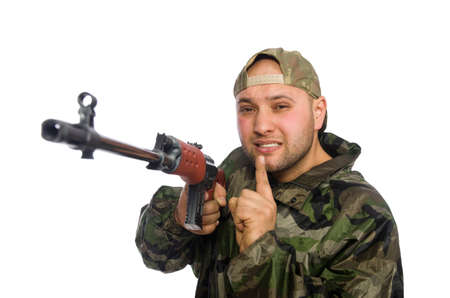 Young man in soldier uniform holding gun isolated on white