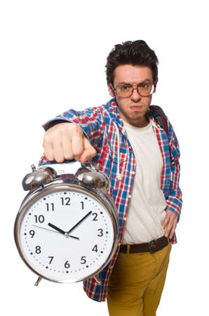 Student with alarm clock isolated on whiteの写真素材