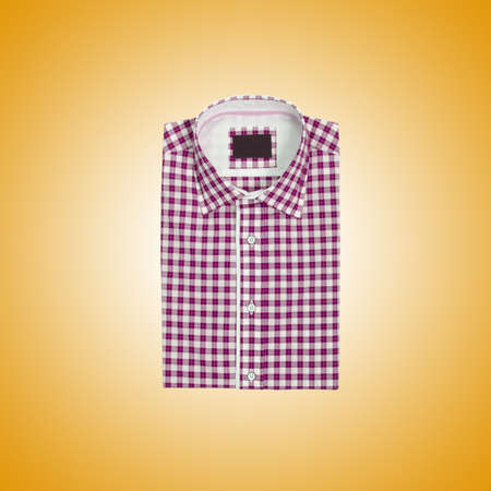 Nice male shirt against the gradientの写真素材