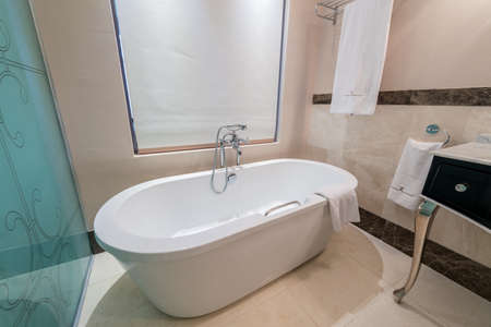 Modern bathroom interior with bathtubの写真素材