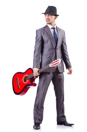 Man with guitar isolated on whiteの写真素材