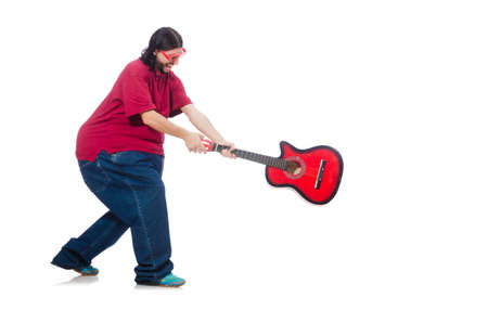 Fat man with guitar isolated on whiteの写真素材