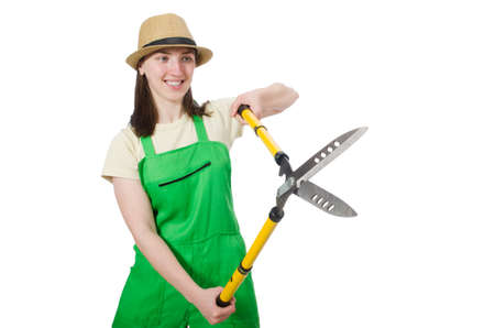 Young woman with shears on whiteの写真素材