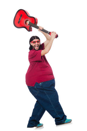 Fat man with guitar isolated on whiteの写真素材